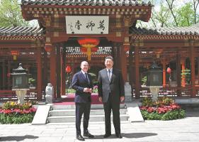 Xi meets Scholz, calls for achieving mutual success
