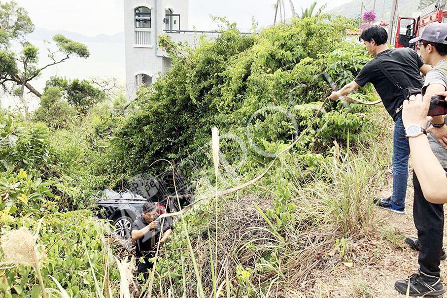 Car plunges down hillside in Coloane