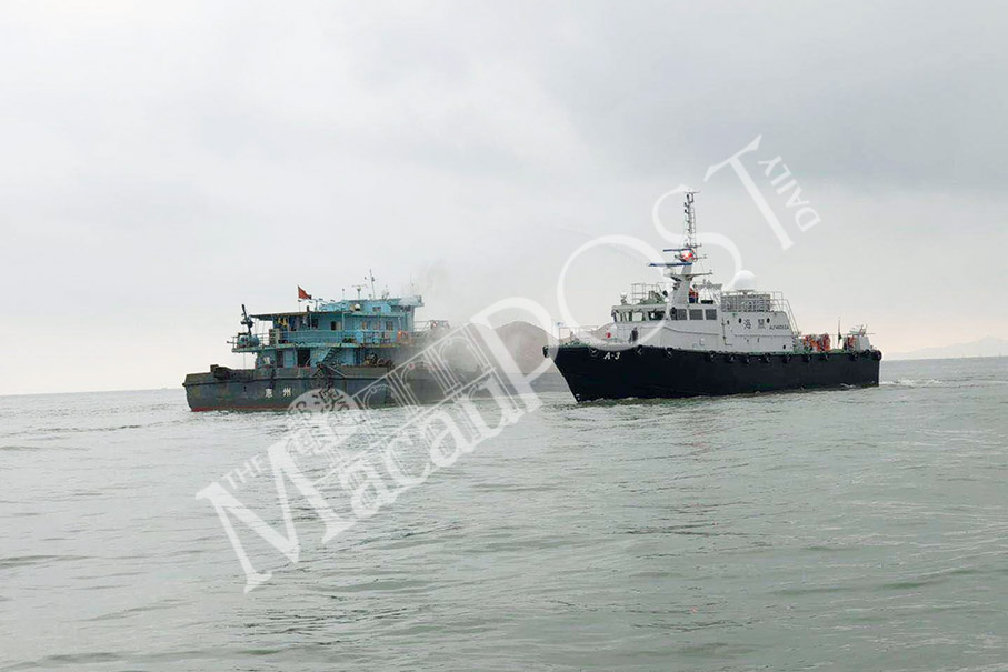 Sand barge catches fire