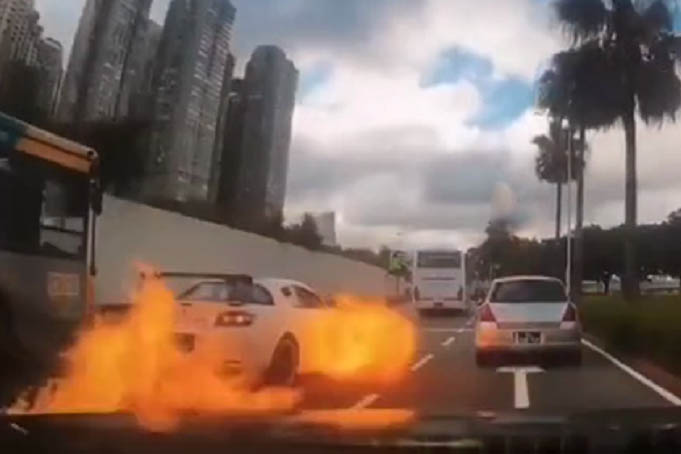 Car catches fire, driver escapes unscathed 