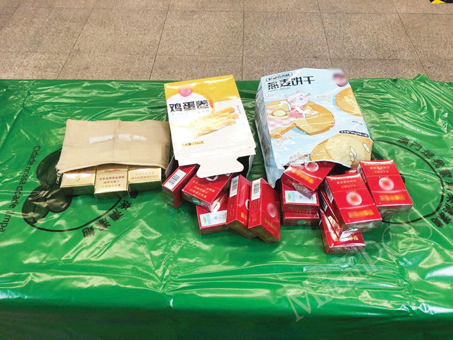 2 locals nabbed for smuggling cigs from mainland  