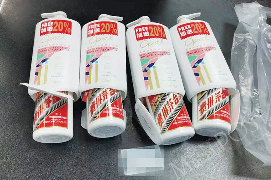 Travellers try to smuggle spirits in shower gel bottles, pushchair, doll, backpack: Gongbei customs