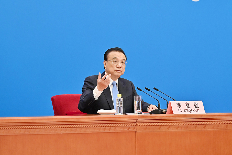 China to make COVID-19 response more scientific, targeted: Premier Li 