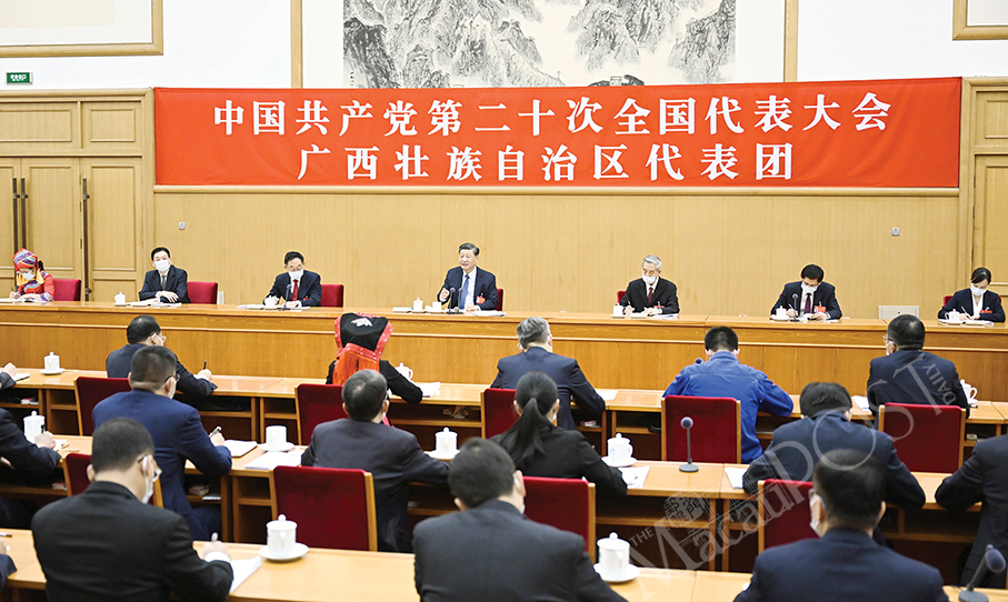 Xi in conversation with fellow delegates at CPC National Congress