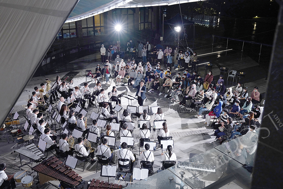 UM Symphonic Band plays rhythmic, dance music at outdoor gig