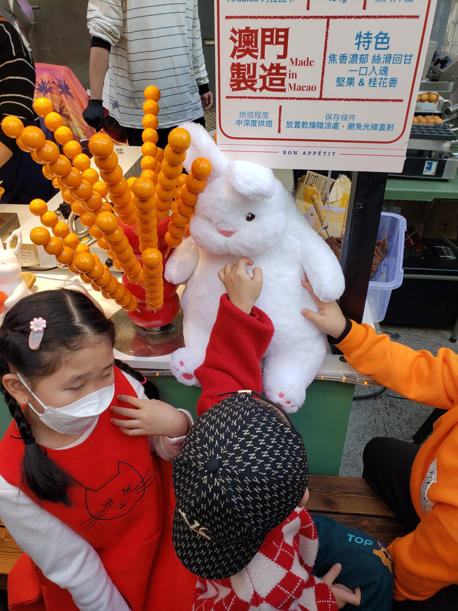 People throng Macau's pedestrianised thoroughfare to celebrate CNY 