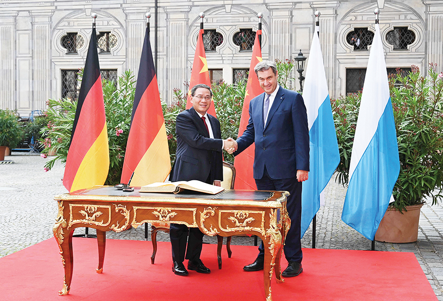 China, Germany push for cooperation, rejecting decoupling