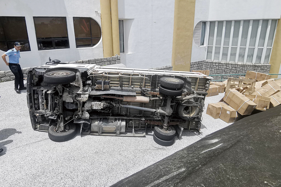 Lorry flips on its side  on UTM campus