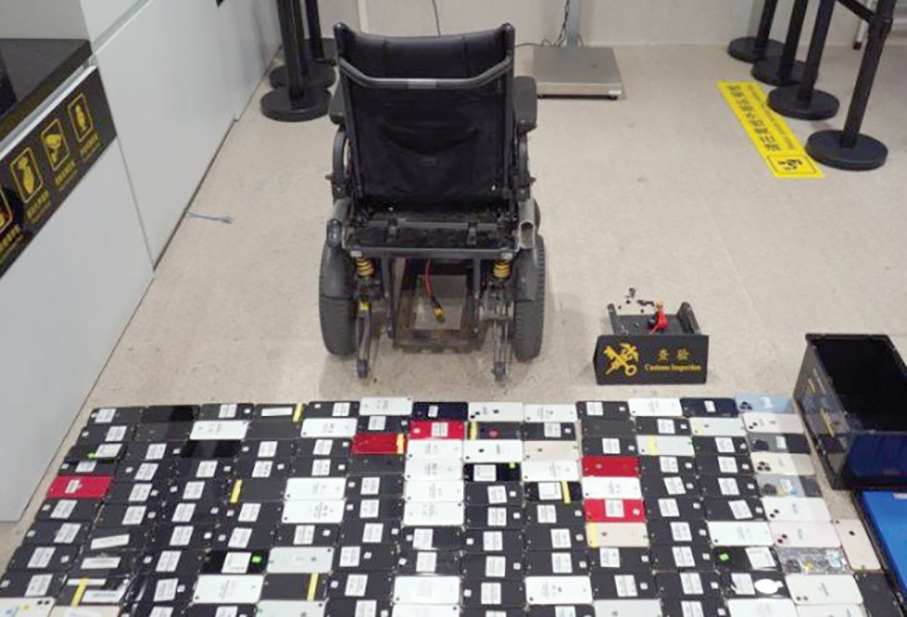 Septuagenarian pretends to be disabled to smuggle 65 phones in e-wheelchair: Gongbei customs