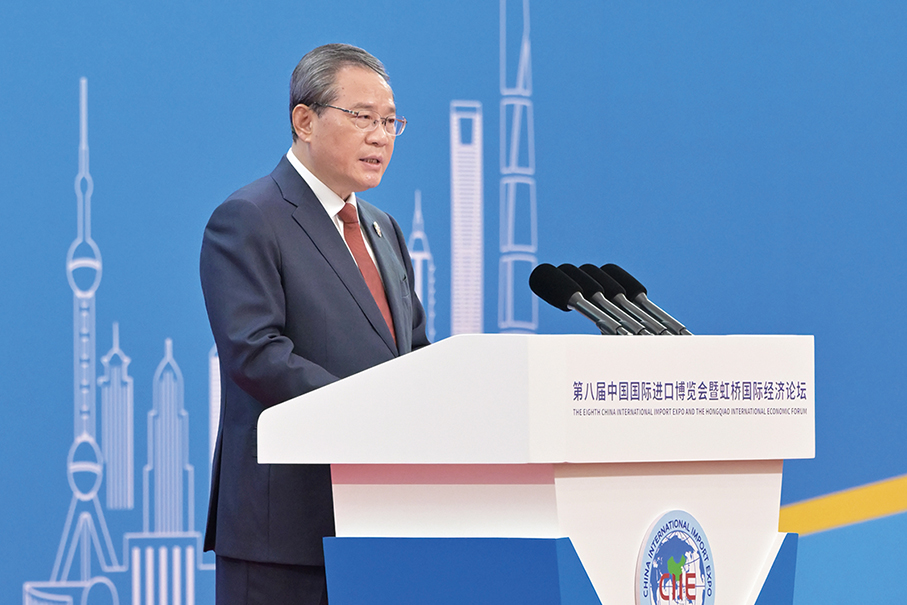 Li Qiang reaffirms commitment to opening up at import expo