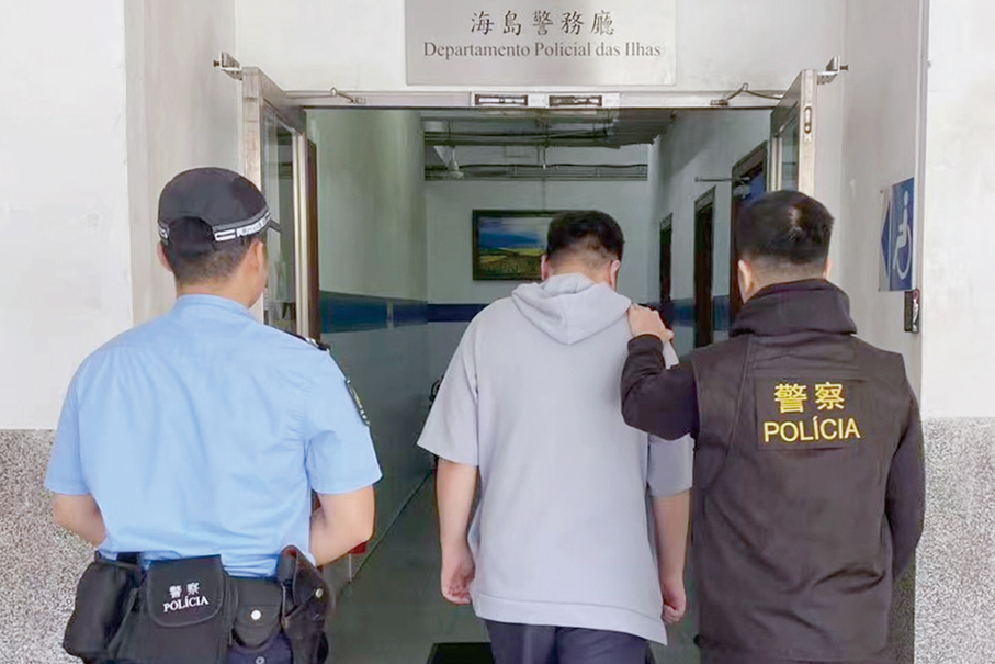Macau police nab local surveillance staff for stealing bike helmet